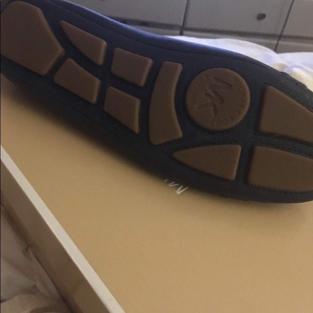 Never worn Michael Kors flats!